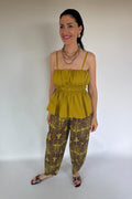 Pantalone ballon marrone e verde acido