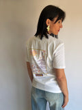 T-Shirt bianca con stampa sulla schiena