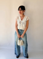 Jeans larghi con margherite
