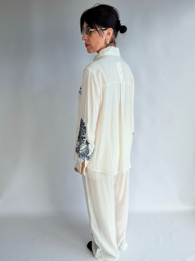Completo camicia e pantalone bianca