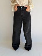 Jeans nero zampa larga  con risvoltone