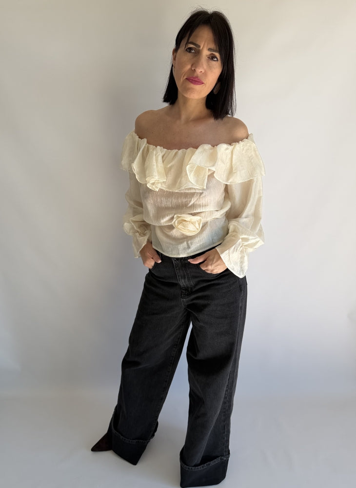 Jeans nero zampa larga  con risvoltone