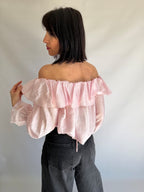 Top rosa semitrasparente